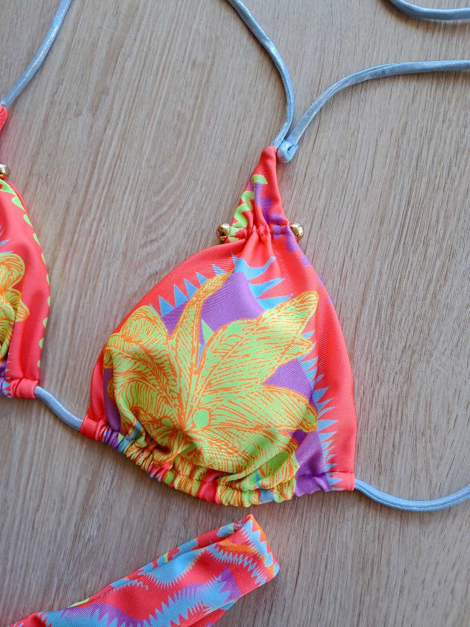 TRIANGOLO CON PIERCING COLORI FLUO - immagine 3