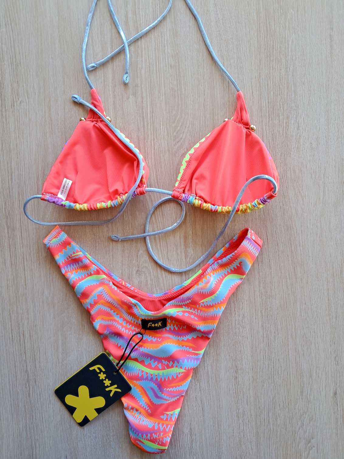 TRIANGOLO CON PIERCING COLORI FLUO - immagine 4